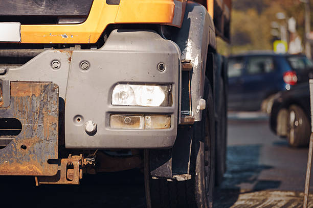 istock Public city street reconstruction with heavy machines. 2230716219