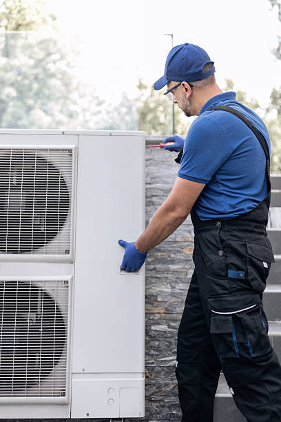 istock Repairman fixing AC outdoor unit. 2230716426