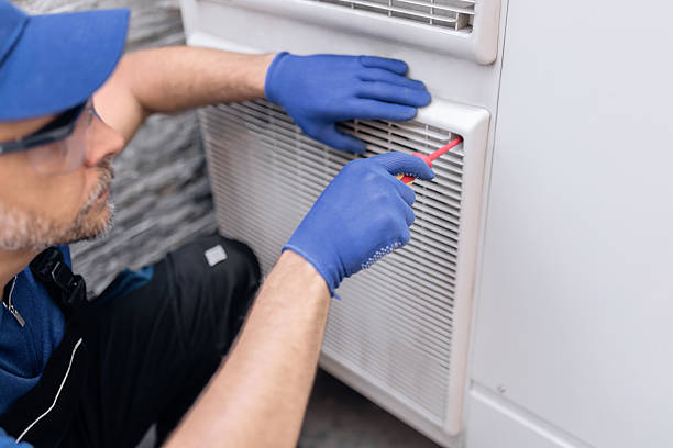 istock Repairman fixing AC outdoor unit. 2230716453