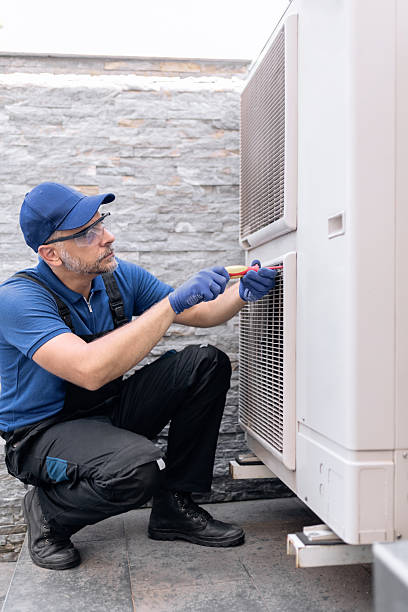 istock Repairman fixing AC outdoor unit. 2230716474