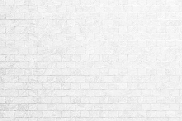 istock Close up modern white brick tiles wall texture background. 2230719324