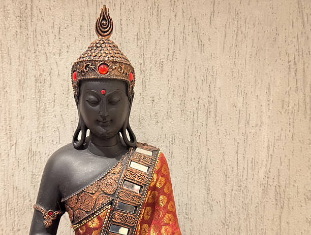 istock Statue of Buddha against the abstract background 2230722043