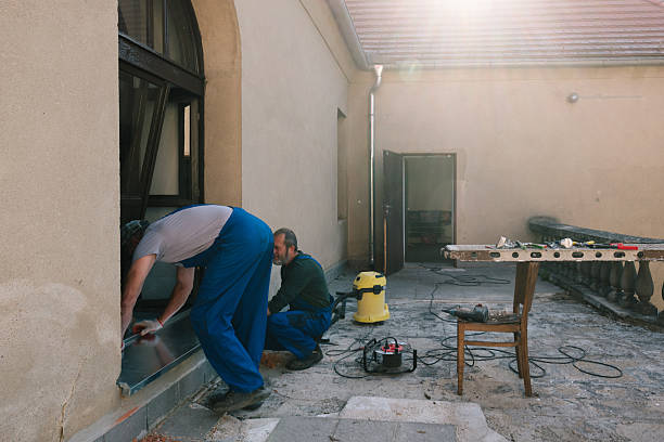 istock Renovation work on a historic villa: craftsmen are preparing to replace an exterior sheet metal window sill. 2230724953