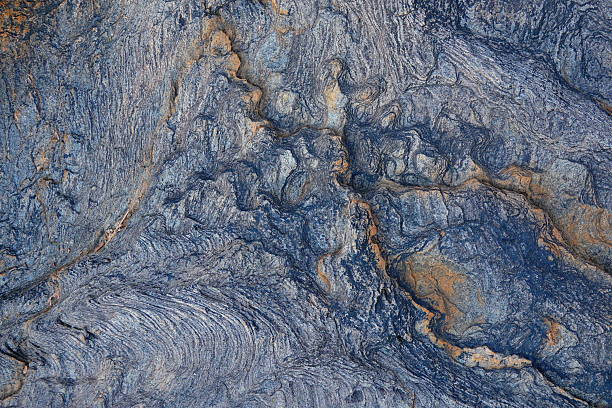 istock Abstract, natural background. Texture and pattern on the weathered surface of a rock. 2230731692