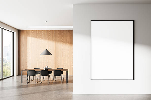 istock Empty poster mockup on white wall in modern dining room interior with wooden panels, concrete floor and clean minimalist design concept template layout. 3D Rendering 2230745014
