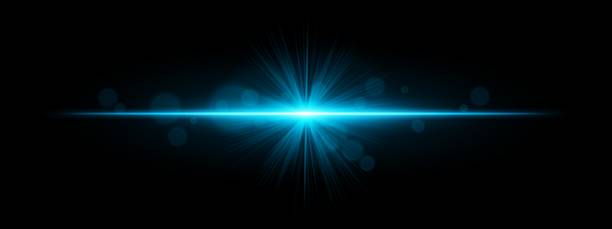 istock Light burst. Star-shaped flash with radial rays and soft bokeh on black background, ideal for magic, fantasy or romantic glow effects. 2230749039