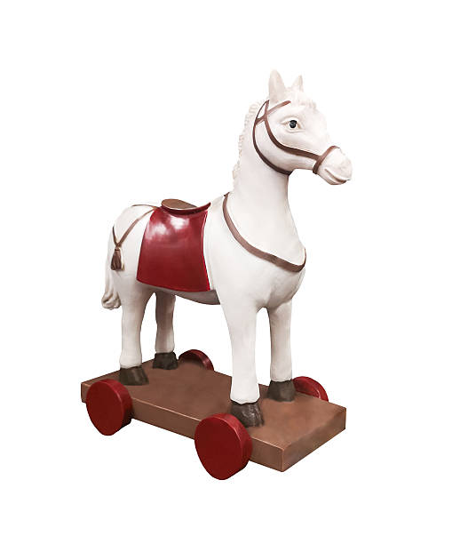 Cheerful little girl enjoys riding her rocking horse on a porch, creating a heartwarming scene of childhood joy