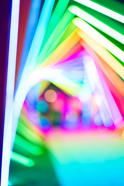 istock out-of-focus colorful light trails at vertical composition as background 2230762726