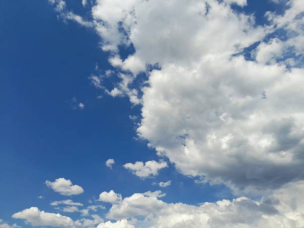 These clouds are called Cumulus.\nThey are white and fluffy clouds resembling cotton piles, usually seen in sunny and pleasant weather.