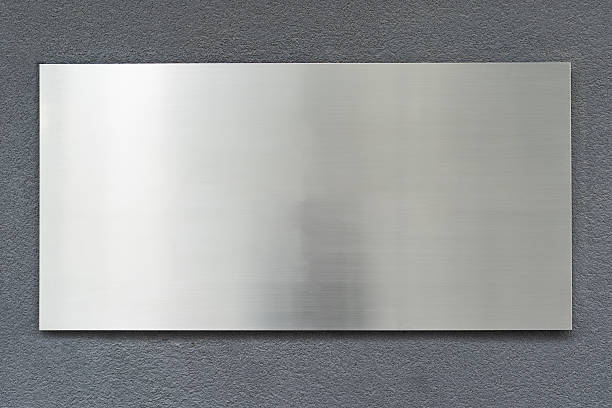 istock Metallic gray sign on concrete or stone wall, empty copy space, mock-up, background for designer 2230766455