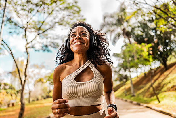 istock Mature woman running on public park 2230772800