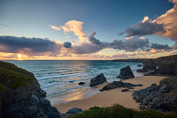 istock Beach at Bedrutheran Steps in Cornwall, England during sunset 2230779404