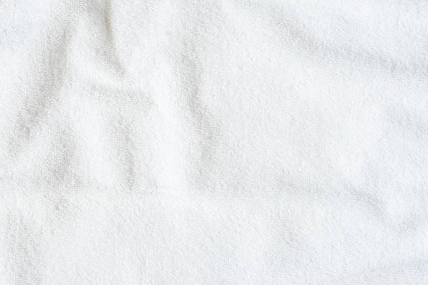 White towel texture background or beach bath fabric, kitchen wiper towel or plain blank cloth bathroom rug made of soft clean cotton fiber material for linen laundry backdrop