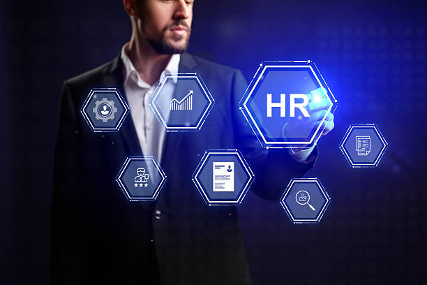 istock Business professional demonstrating human resources concepts with digital icons at a technology-focused event 2230781736