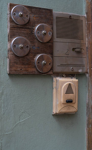 istock multiple doorbells on residential building wall 2230784076