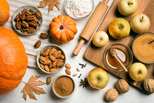 istock Autumn fall baking background with pumpkins and ingredients 2230801028