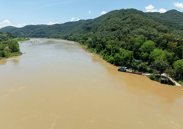 istock Ferry Boat Crossing the Mekong River 2230801416