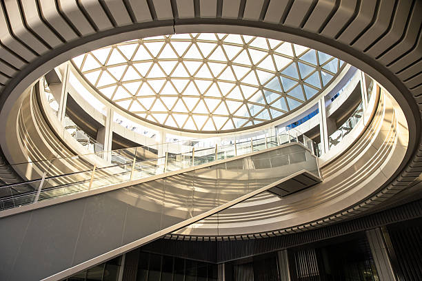 istock Moving escalator at modern illuminated business district 2230803104