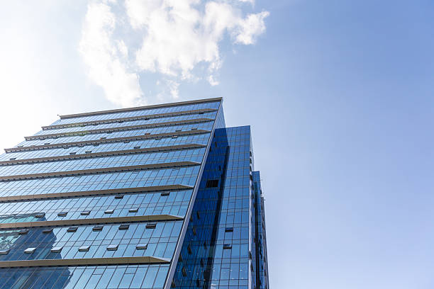istock Looking up view of futuristic building 2230805663