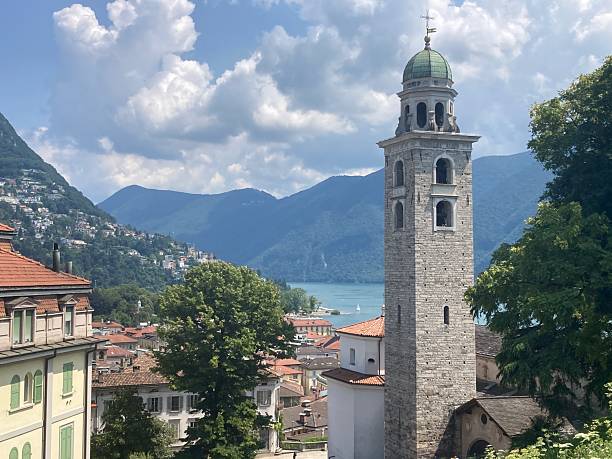 istock Panoramic view of Central Lugano church tower in foreground. 2230806202
