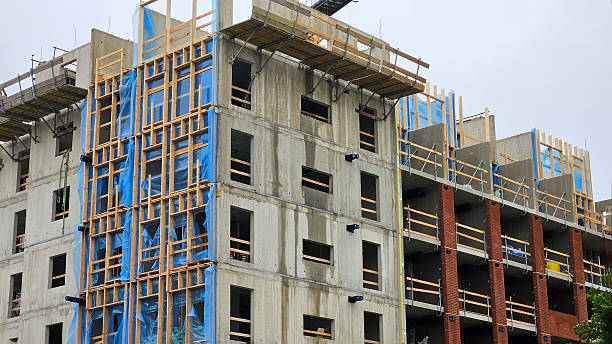 istock Concrete Building Structure Under Construction with Wooden Details 2230807720