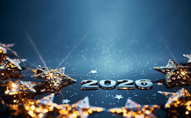 istock Glowing Golden Star Decorations and Shiny 2026 Numbers on Blue Festive Background 2230808421