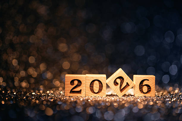 istock Creative 2026 Countdown Concept with Tilted Wooden Block and Sparkling Background 2230808443