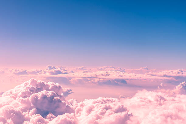 istock Filling the sky, beautiful pink and purple clouds create a breathtaking sunset, forming a dreamy and colorful atmosphere that invites feelings of peace and serenity 2230808846