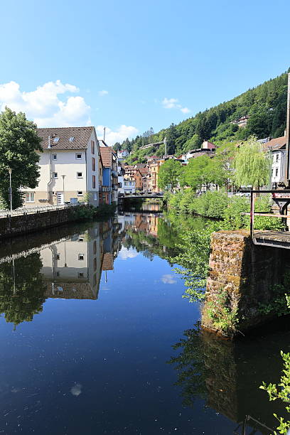 istock Buildings are reflected in the great Enz in Bad Wildbad 2230809066
