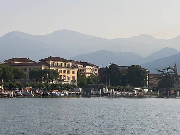 istock Panoramic view of Lake Lugano with architecture in background. 2230809978