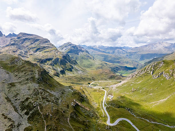 istock Winding Mountain Road Through Alpine Valley 2230811414