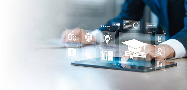 istock e-learning education concept, man use laptop with icons representing online education, Learning using artificial intelligence, ai, educational tools, video tutorial digital courses, internet lessons. 2230814183