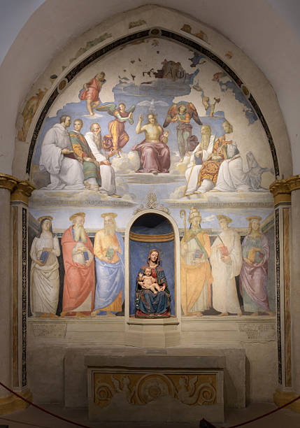 istock Fresco 'Trinita e santi' in Cappella di San Severo, Perugia. Upper by Raphael (1505-08), lower by Perugino (1521), with Madonna and Child terracotta sculpture. 2230824454