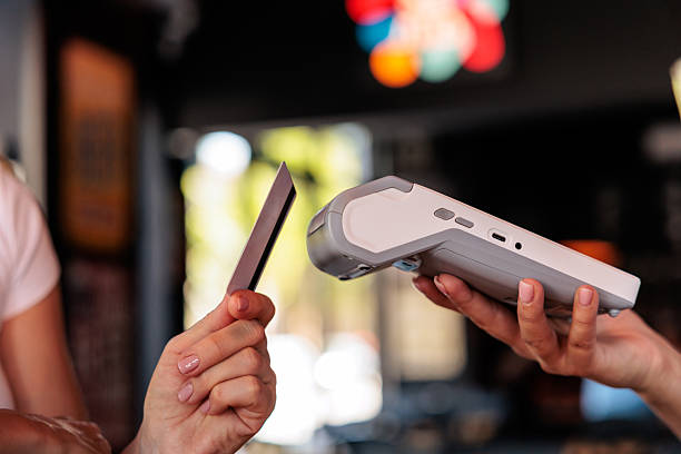 istock Close-Up of Paying with Credit Card 2230825010