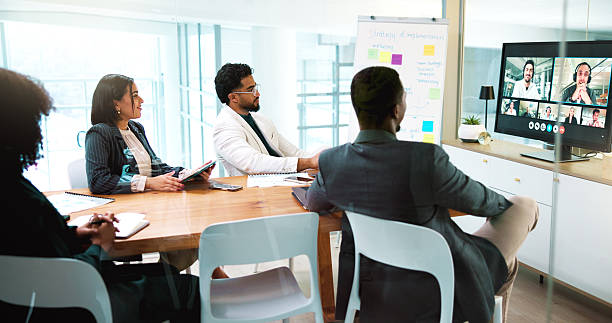 istock Computer screen, feedback and video call with business people in office boardroom for webinar. Display, review and virtual meeting with employee team in workplace for online seminar or workshop 2230831816