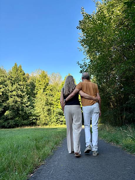 istock Close Senior holding each other during an outdoor Walk. 2230832135