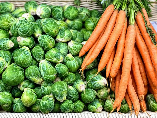 Brussels sprouts and carrots in a basket