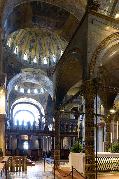 istock Marble altar and twisted sculpted columns of the ciborium inside St Mark's Basilica, Venice, Italy. 2230834890