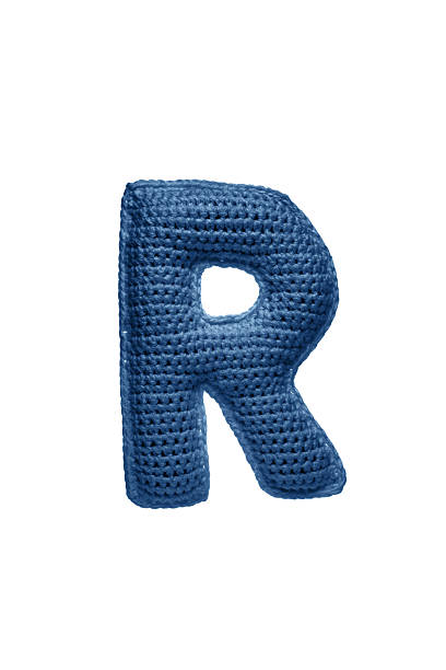 istock A large letter R, handmade from blue knitted yarn. 2230840504