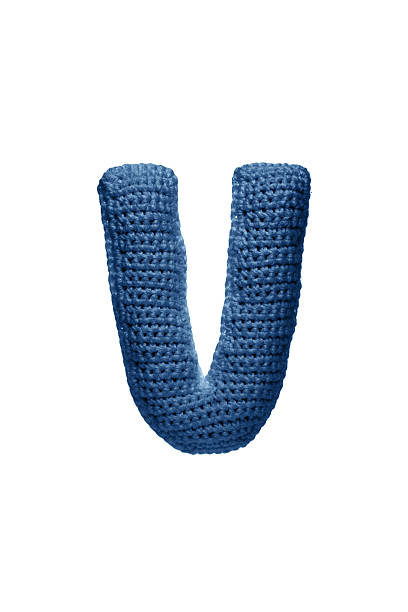 istock A large letter V, handmade from blue knitted yarn. 2230840509