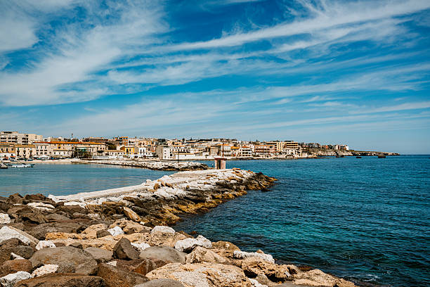 istock Coastal View of Syracuse, Sicily Featuring Clear Waters and Historic Architecture 2230846679