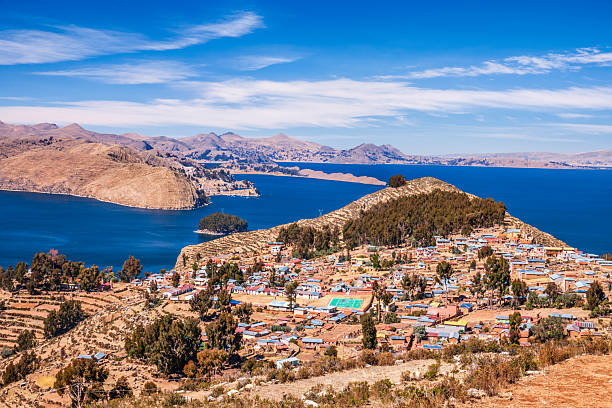 View from Isla del Sol (Island Of The Sun), Lake Titicaca, Bolivia. Isla del Sol is an island in the southern part of Lake Titicaca. It is part of the modern Plurinational State of Bolivia. Titicaca is a highest navigable lake in the Andes on the border of Bolivia and Peru. Lake Titicaca  it is also the largest lake in South America.