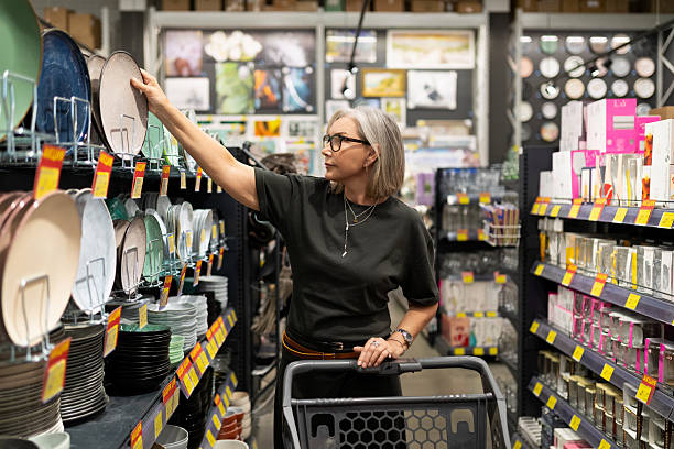 istock Shoppers explore home goods aisle while selecting plates in a retail store during daytime 2230854222
