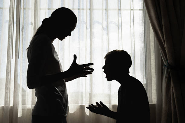 istock Mother and son shouting, fighting,  arguing, parenting family problem relationship concept 2230856919