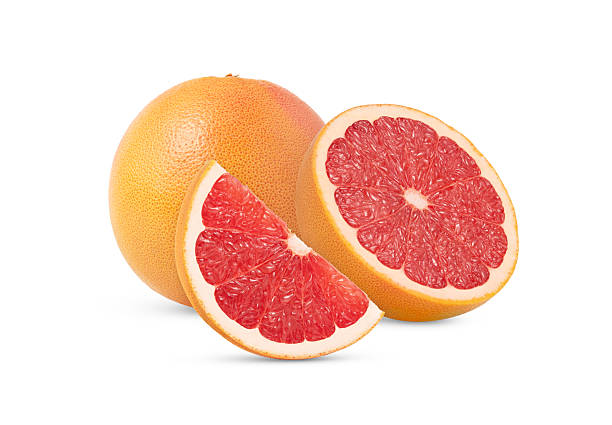 istock Grapefruit with cut in half isolated. Grapefruit cut and whole grapefruit. Halved ripe grapefruit. 2230856967
