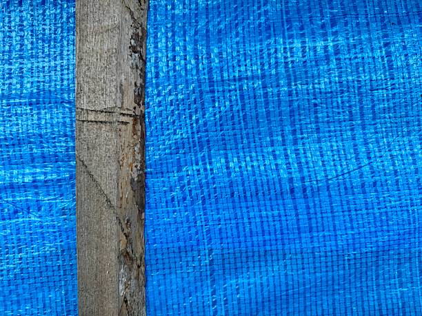 istock Wooden board on blue tent background 2230861344