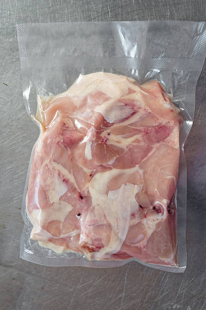 istock Fresh white chicken meat: thighs, fillets, and breasts in vacuum packaging 2230868738