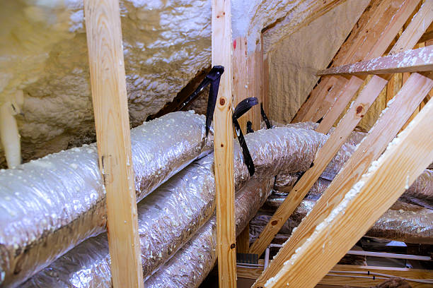 istock Insulation installation in residential attic showcases efficient air duct system for temperature control 2230881554