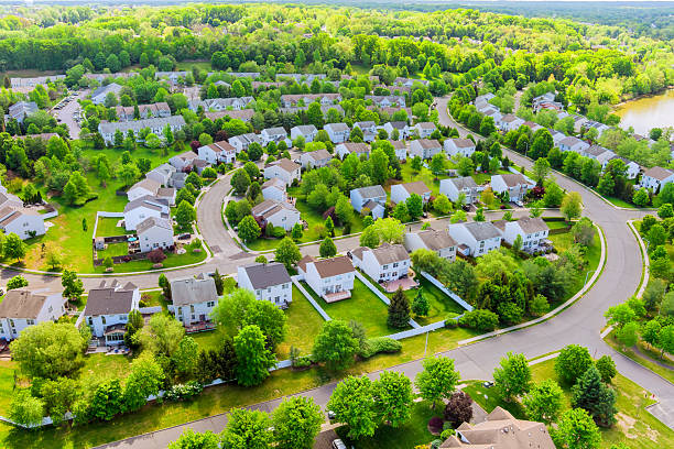 istock Residential development. Curving streets amid lush greenery in East Brunswick, NJ 2230881638