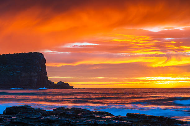 Sunrise Seascape rain clouds at Avalon on the Northern Beaches of Sydney, NSW, Australia.